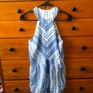 Medium Crystal Sky romper with tassels in front